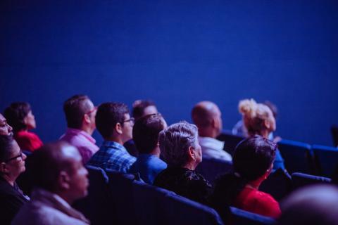 People sitting in an auditorium